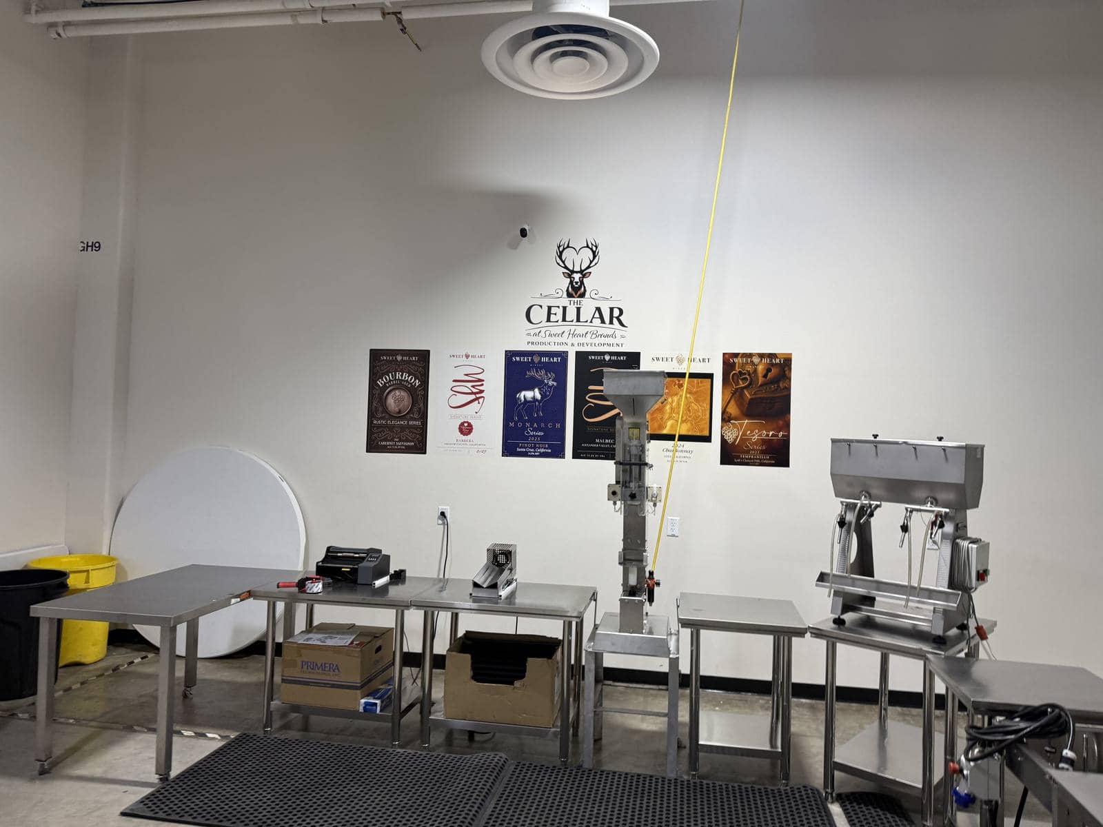 The bottling and canning line below the Cellar sign